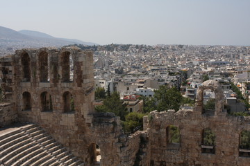 Ancient Odeon of Herodes Atticus in Athens, Greece on Acropolis hill with view over the city.