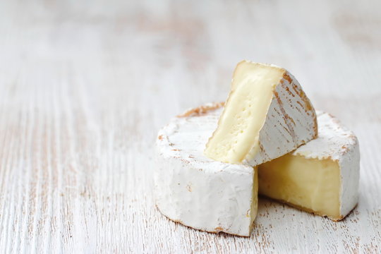 Brie type of cheese. Camembert cheese.