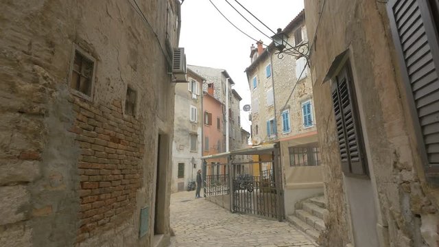 Old walls on a street in Rovinj