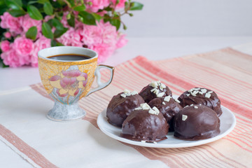 Breakfast. Homemade candy coated chocolate lay on a plate along