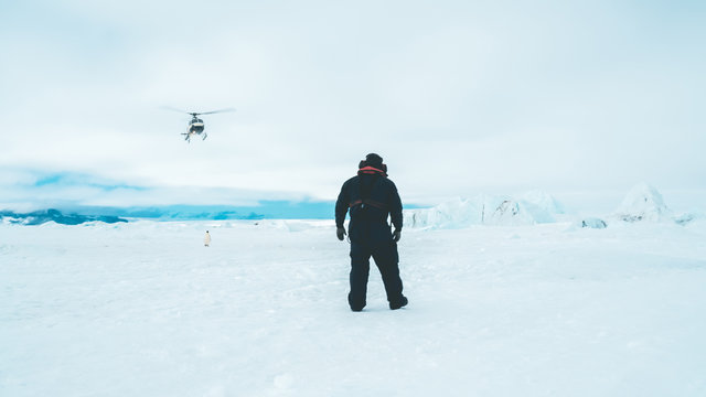 Helicopter approaching the Sea Ice - Antarctica