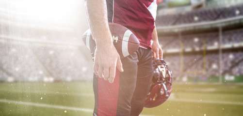 closeup American Football Player isolated on big modern stadium