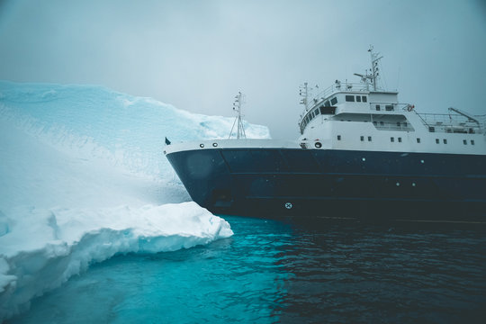 Ship landing on frozen Shore - Antarctica