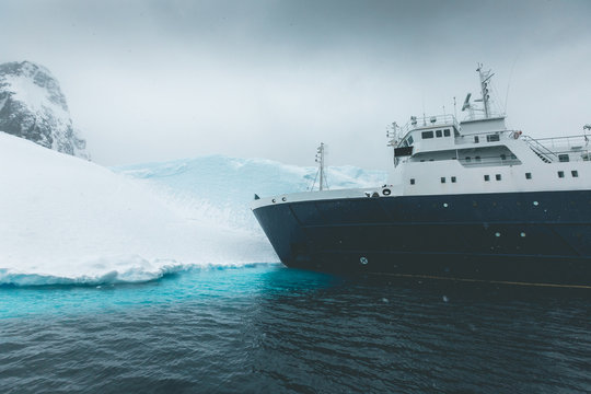 Ship landing on frozen Shore - Antarctica