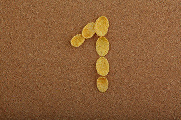 Corn Flakes numbers wooden background 