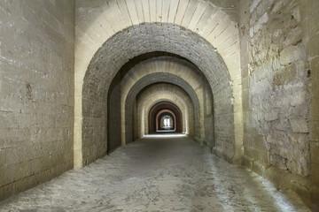 corridor in an old fortress with ceiling vaults