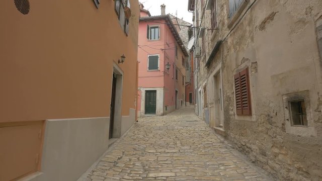 Paved street with old houses