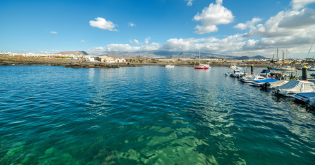 Las Galletas sea bay with harbor