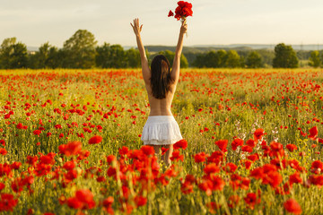 a girl on a poppy field