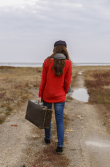 girl walking on the road
