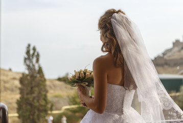 the bride looks into the distance