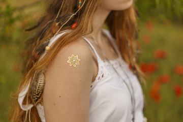 drawing on the girl's shoulder