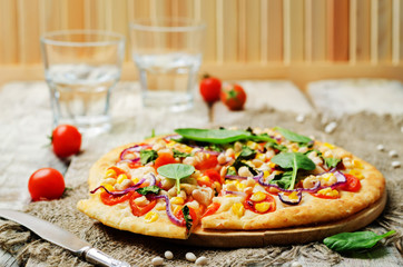 white beans, spinach, corn and tomato pizza with white beans crust