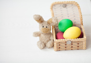 Easter decoration with sugar rabbits, color eggs