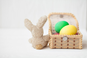 Easter decoration with sugar rabbits, color eggs