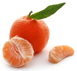 Fresh orange with green leaf