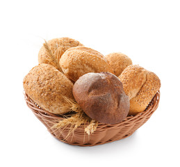 Basket with bread products on white background