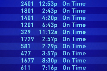 Flight departures board at JFK Airport in New York, NY
