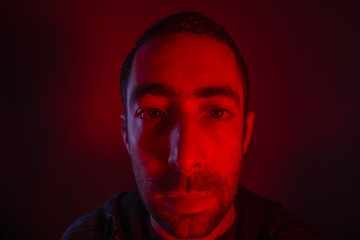 Man with serious facial expression