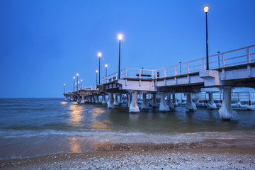 Naklejka premium Baltic Sea pier in Gdansk at dusk, Poland
