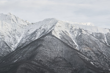 Fototapeta na wymiar mountain peaks white snow sochi in winter