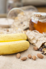 Bananas with muesli for breakfast. Healthy food. Fitness food. Morning at home.