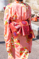 ひな祭りに着物を着た女の子の後ろ姿、日本