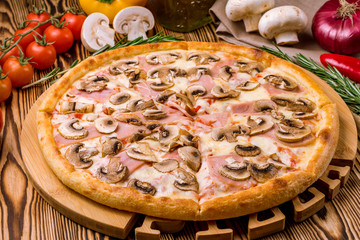 Pizza with ham and mushrooms