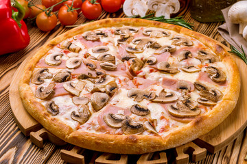 Pizza with ham and mushrooms