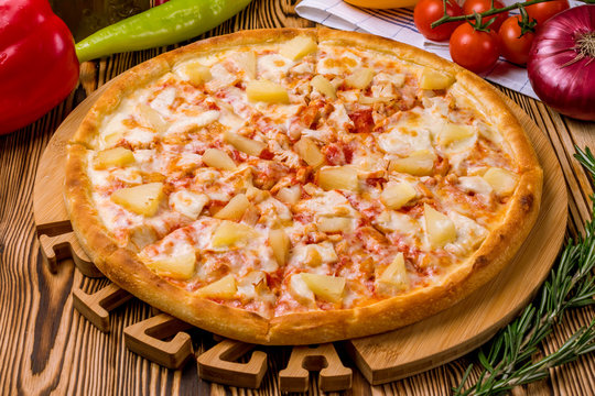 pizza Hawaiian with pineapple and chicken