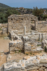 Fototapeta na wymiar Columns in Ruins of ancient church in Archaeological site of Aliki, Thassos island, East Macedonia and Thrace, Greece
