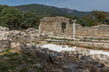 Fototapeta na wymiar Columns in Ruins of ancient church in Archaeological site of Aliki, Thassos island, East Macedonia and Thrace, Greece