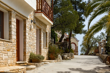 Church and spring flowers in Archangel Michael Monastery in Thassos island, East Macedonia and Thrace, Greece 