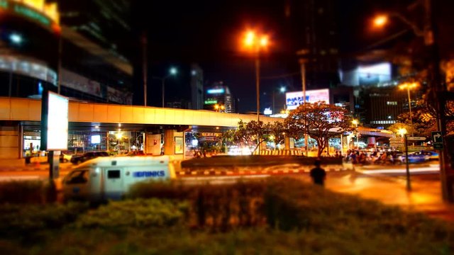 Time lapse traffic congestion at Sathorn junction in Bangkok, Thailand - Miniature zoom effect