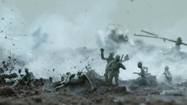 Explosion on a battlefield with toy soldiers, Ultra Slow Motion