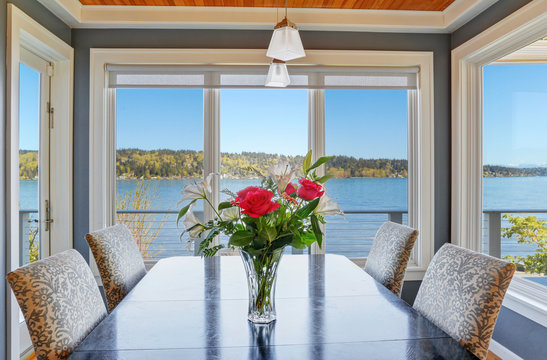 Light dining room with beautiful view of Lake Washington