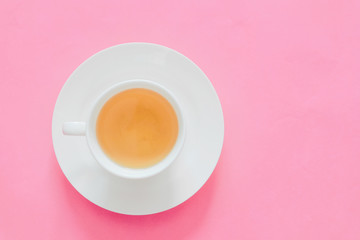 Cup of hot green tea Health drinks Pink background The concept diet