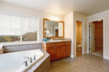 Gorgeous spa like bathroom with two vanity cabinets.