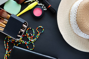 Women's cosmetics bag summer Style fashion of travel accessories on black colorful background.fashion and beauty concepts.