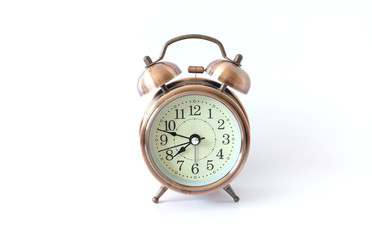 Gold Alarm clock on white background