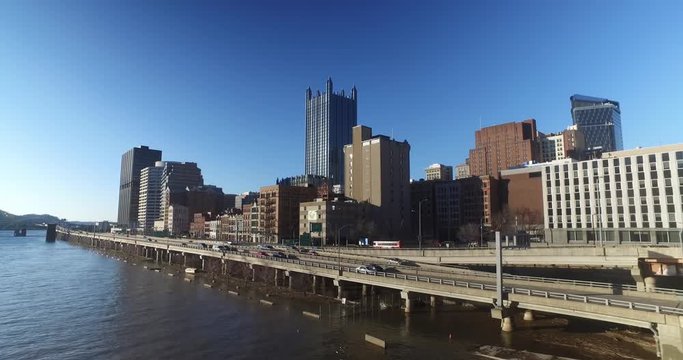 A view of the Pittsburgh city skyline and Monongahela River on a late winter sunny day as seen from the Smithfield Street Bridge.  	