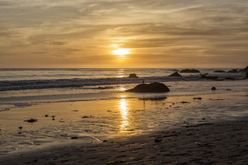 Fototapeta na wymiar A Yellow Sunset in the Beach