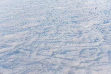 White clouds on the sky, high angle view from air plane