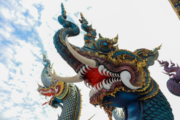 Blue Serpent Statue, Statues of the naga in Buddhist Temple.Chiang Rai,northern of Thailand
