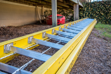 Yellow Ladder on the ground 