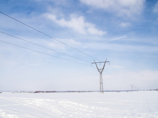 High voltage tower on a background of the winter sky. winter