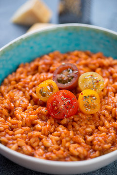 Close-up of risotto with tomatoes, selective focus, shallow depth of field