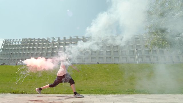 Man running and holding a torch, Ultra Slow Motion 
