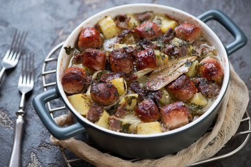 Bowl of Dublin coddle or Irish coddle, traditional potato, sausage and bacon stew, studio shot, selective focus