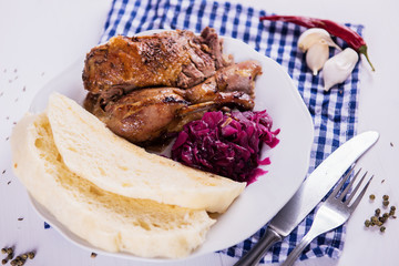 roast crispy duck wit red cabbage and dumplings eastern central european traditional rustic recipe 